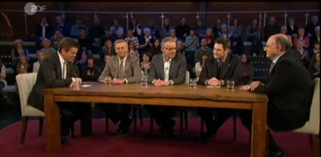 Screenshot einer Sendung von Markus Lanz mit mehreren Personen an einem Tisch.